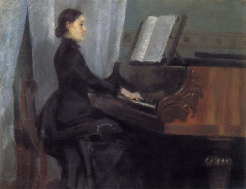 William Stott of Oldham CMS at the Piano
